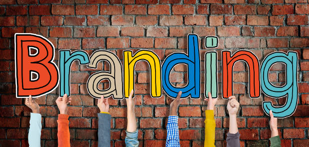 Hands Holding the Word Branding