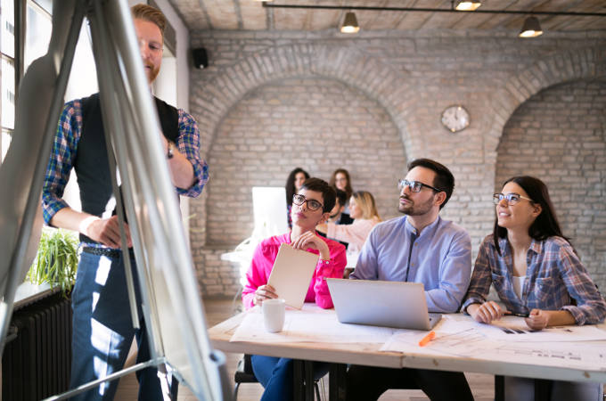 Presentation and creative briefing held in office to coworkers